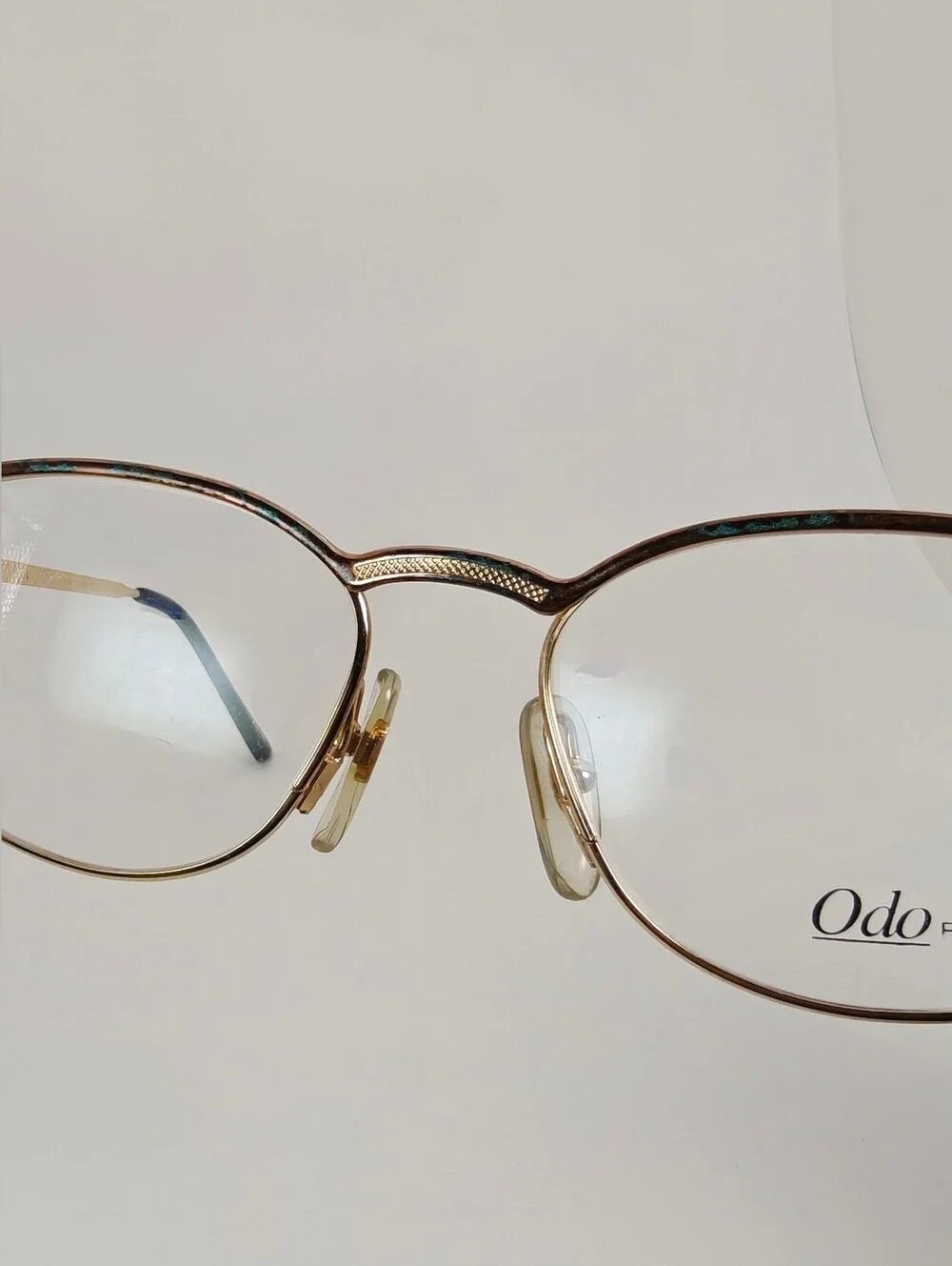 Manola Odo Frames Round Gold-Tone. Glasses with Subtle Copper Weathered Patina.